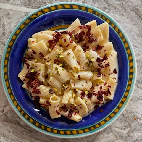 Pasta with Fonduta, Peperoni Cruschi, and Pistachio